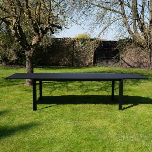 Table De Jardin 8/12p En Aluminium Et Plateau En Verre Poli Noir Modulo
