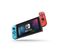 Console Nintendo Switch Avec Un Joy-con Bleu Néon Et Un Joy-con Rouge Néon